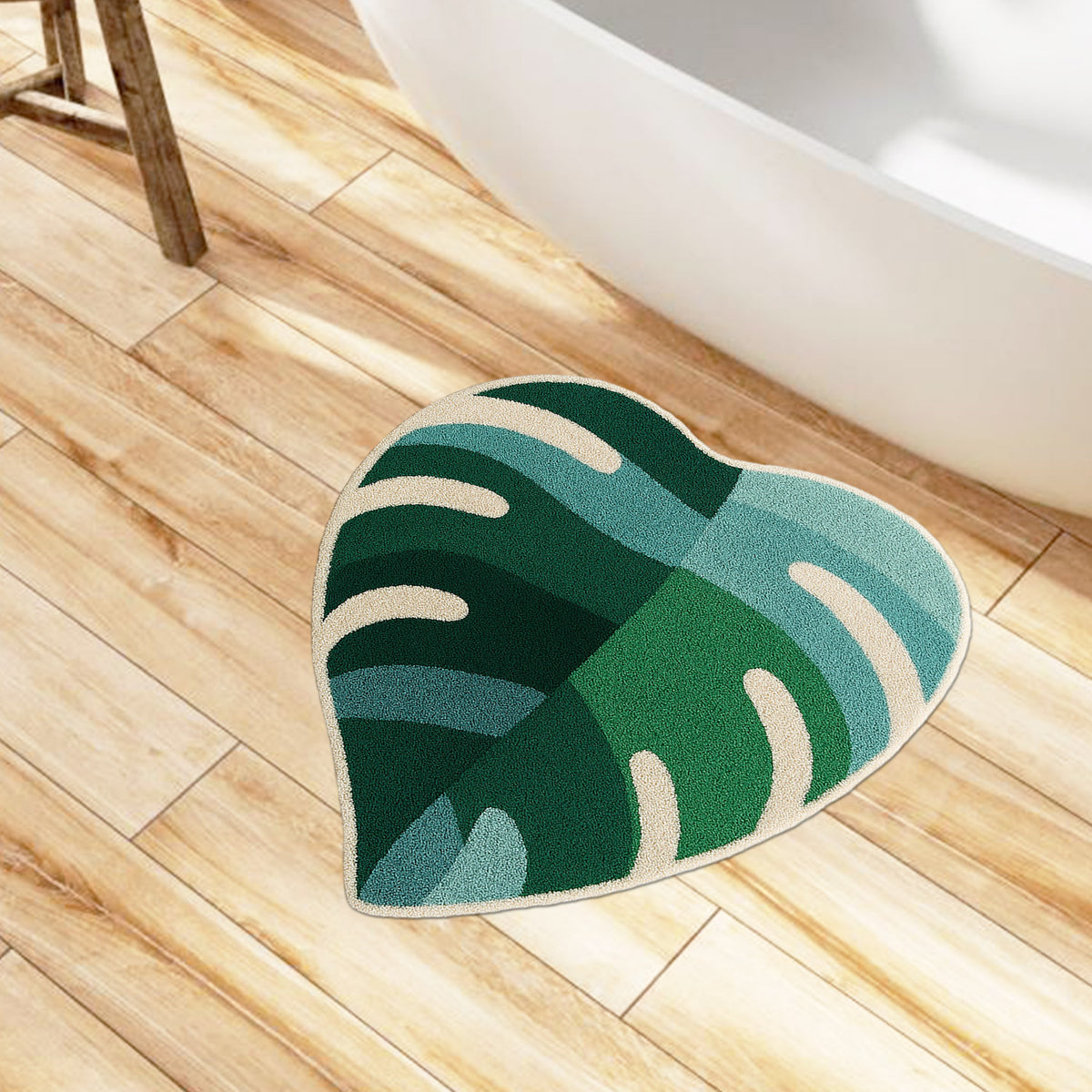 Feblilac Green Leaves with Pink Heart tufted bath mat flat lay on a clean white background