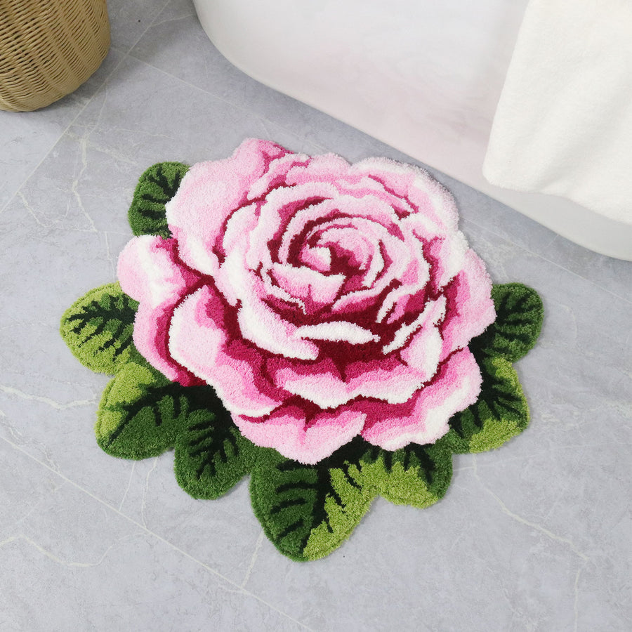 Feblilac Single Flower tufted bath mat in a bright bathroom beside the bathtub