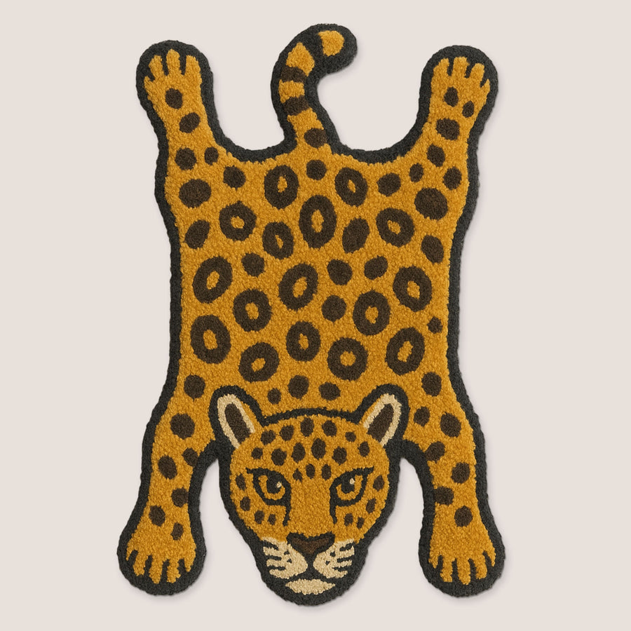 Feblilac Leopard tufted bath mat in a bright bathroom beside the bathtub