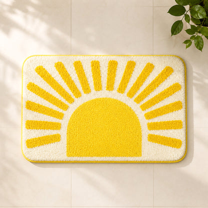 Feblilac Golden Sun tufted bath mat in a bright bathroom beside the bathtub