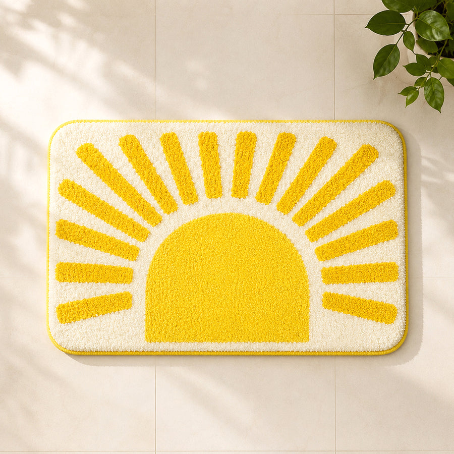 Feblilac Golden Sun tufted bath mat in a bright bathroom beside the bathtub