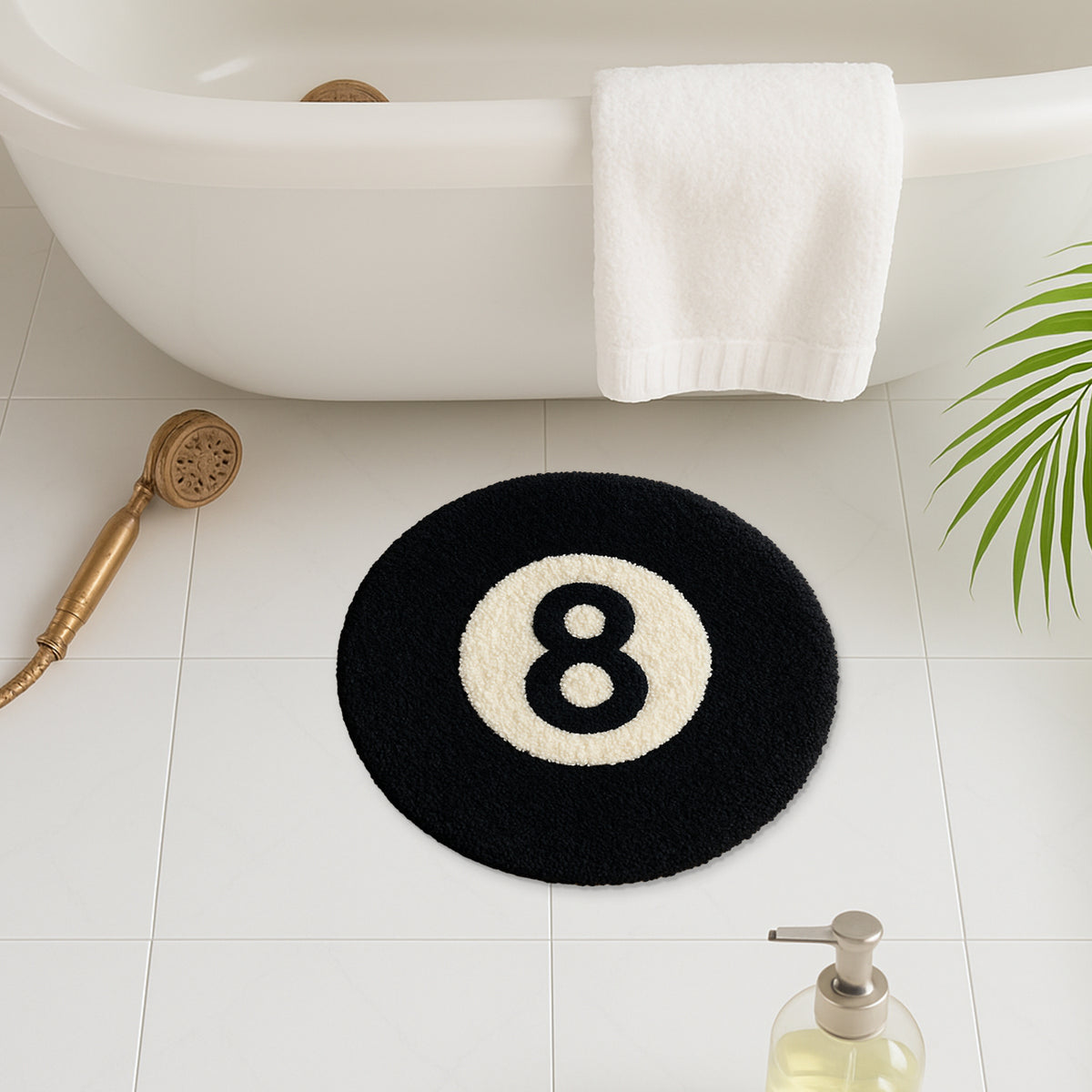 Feblilac 8 Ball tufted bath mat in a bright bathroom beside the bathtub