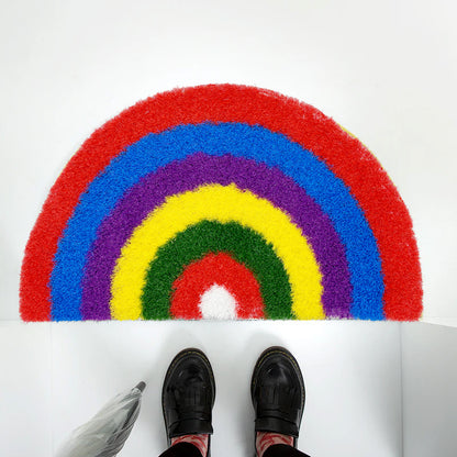 Feblilac Semicircle Rainbow PVC coil door mat in a bright bathroom beside the bathtub