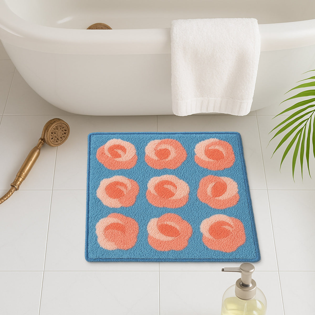 Feblilac Roses on Blue tufted bath mat in a sunny bathroom with a potted plant