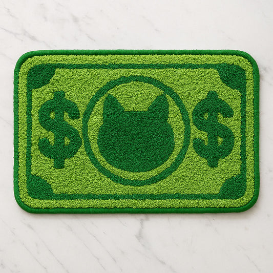 Feblilac Green Cat and Dollar tufted bath mat in a bright bathroom beside the bathtub