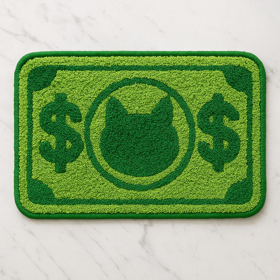 Feblilac Green Cat and Dollar tufted bath mat in a bright bathroom beside the bathtub