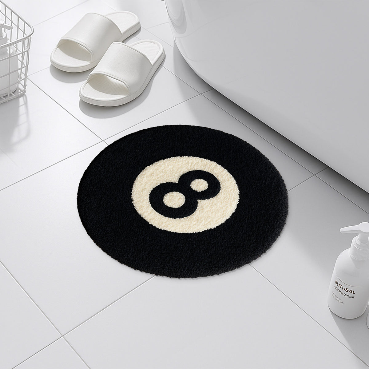 Feblilac 8 Ball tufted bath mat in front of a bathroom vanity with fresh towels