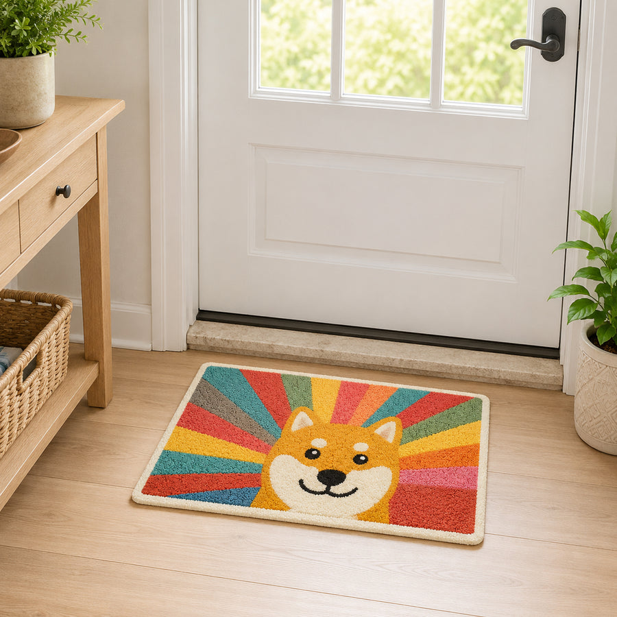 Feblilac Rainbow Shiba Inu tufted bath mat in front of a bathroom vanity with fresh towels