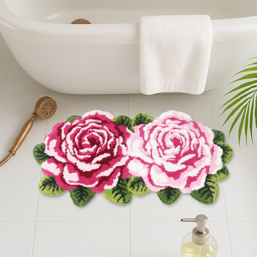 Feblilac Two Flowers tufted bath mat in front of a bathroom vanity with fresh towels