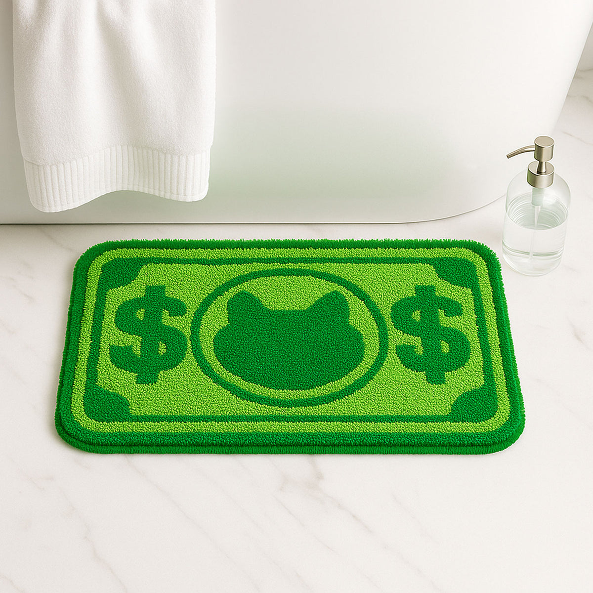 Feblilac Green Cat and Dollar tufted bath mat in front of a bathroom vanity with fresh towels