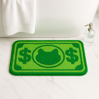 Feblilac Green Cat and Dollar tufted bath mat in front of a bathroom vanity with fresh towels