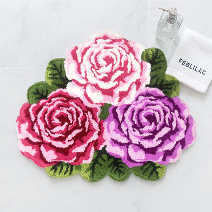 Feblilac Three Flowers tufted bath mat in front of a bathroom vanity with fresh towels