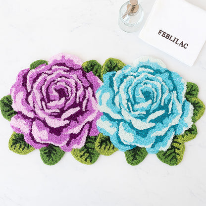 Feblilac Two Flowers tufted bath mat in front of a bathroom vanity with fresh towels
