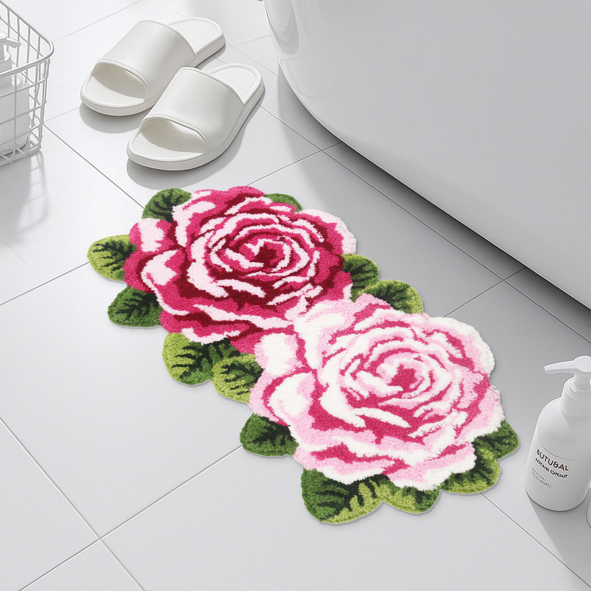 Feblilac Two Flowers tufted bath mat on a wood floor next to a soaking tub