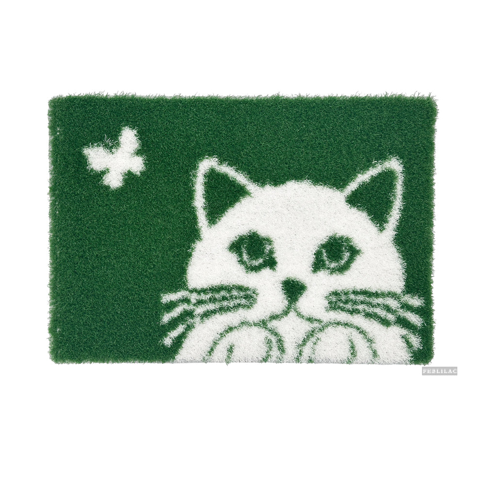 Feblilac Cat and Butterfly PVC coil door mat on a wood floor next to a soaking tub