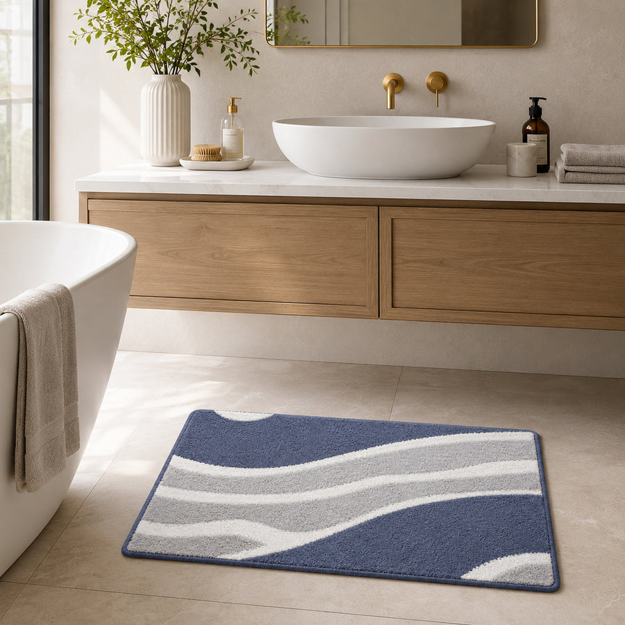 Feblilac White Grey and Blue Minimal Pattern tufted bath mat in a sunny bathroom with a potted plant