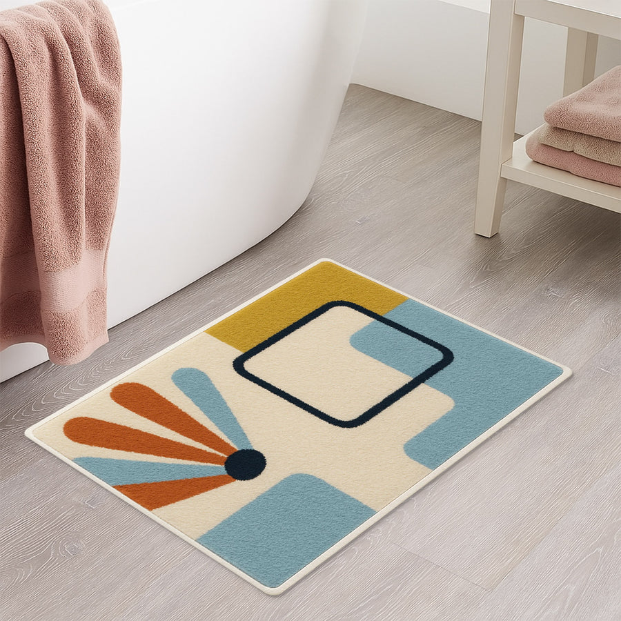 Feblilac Minimal Blue Yellow Black Geometric tufted bath mat in a sunny bathroom with a potted plant