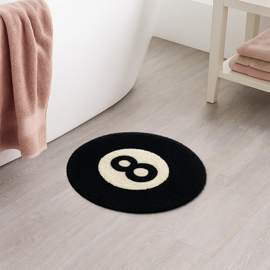 Feblilac 8 Ball tufted bath mat in a sunny bathroom with a potted plant