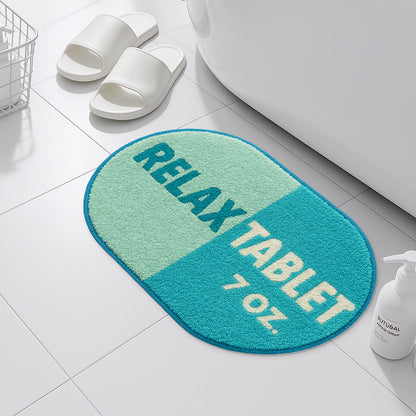 Feblilac Blue Relax tufted bath mat in a sunny bathroom with a potted plant