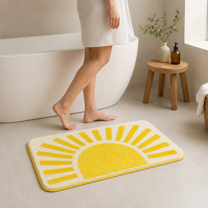 Feblilac Golden Sun tufted bath mat in a sunny bathroom with a potted plant