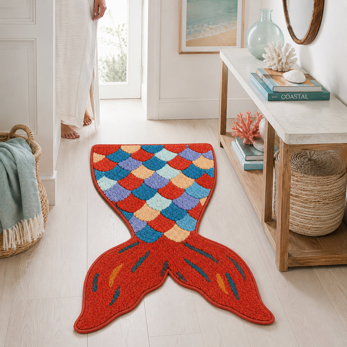 Feblilac Red Mermaid Tail tufted bath mat by the sink with slippers and a towel basket