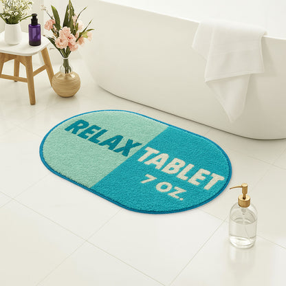 Feblilac Blue Relax tufted bath mat by the sink with slippers and a towel basket