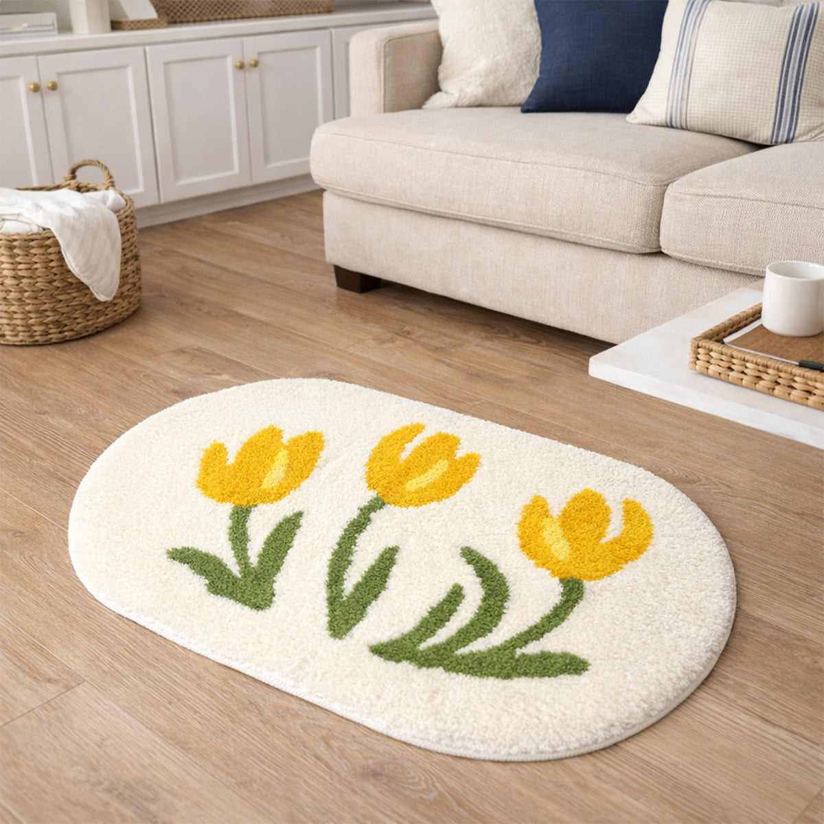 Feblilac Tulip tufted bath mat by the sink with slippers and a towel basket