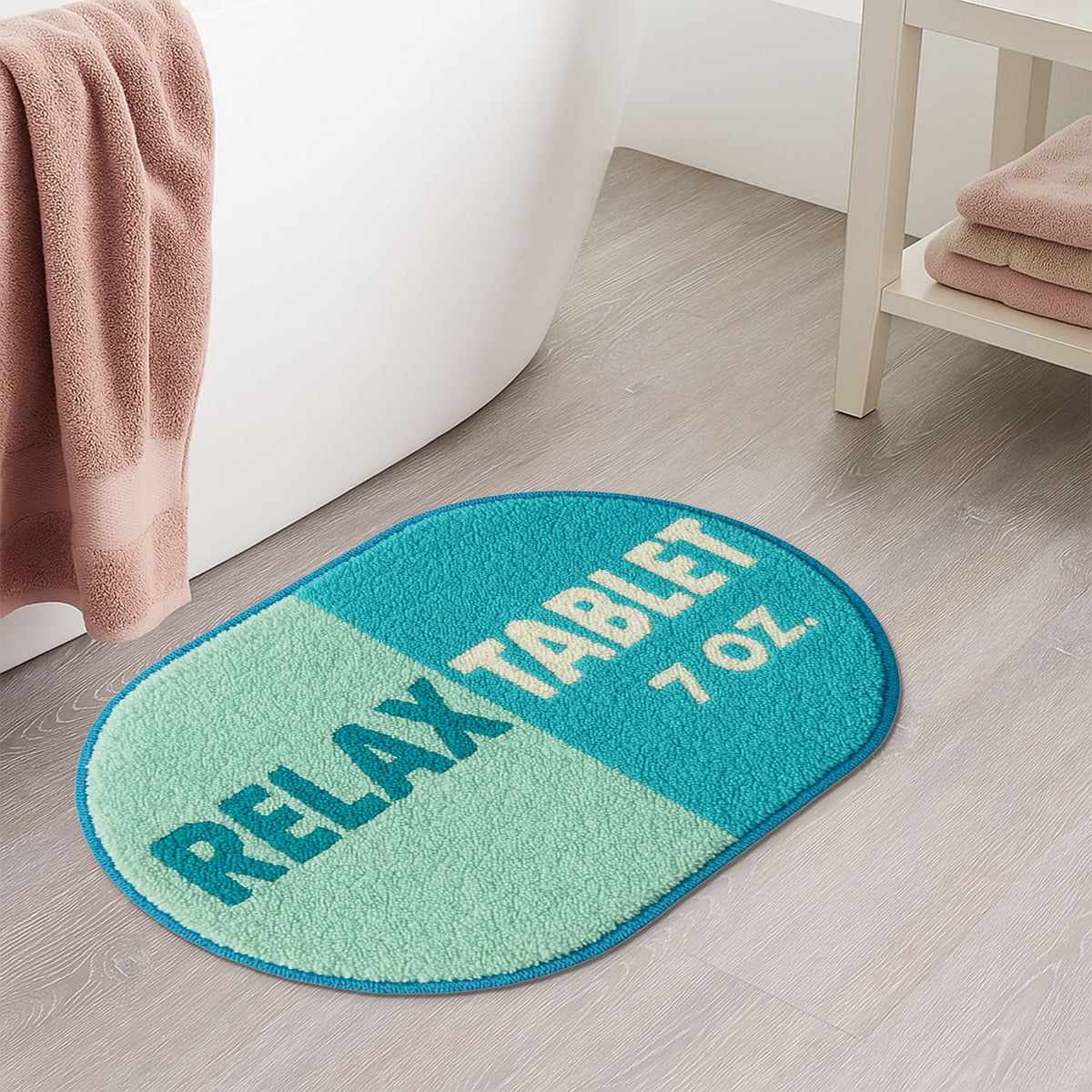 Feblilac Blue Relax tufted bath mat in a minimal bathroom with marble tile