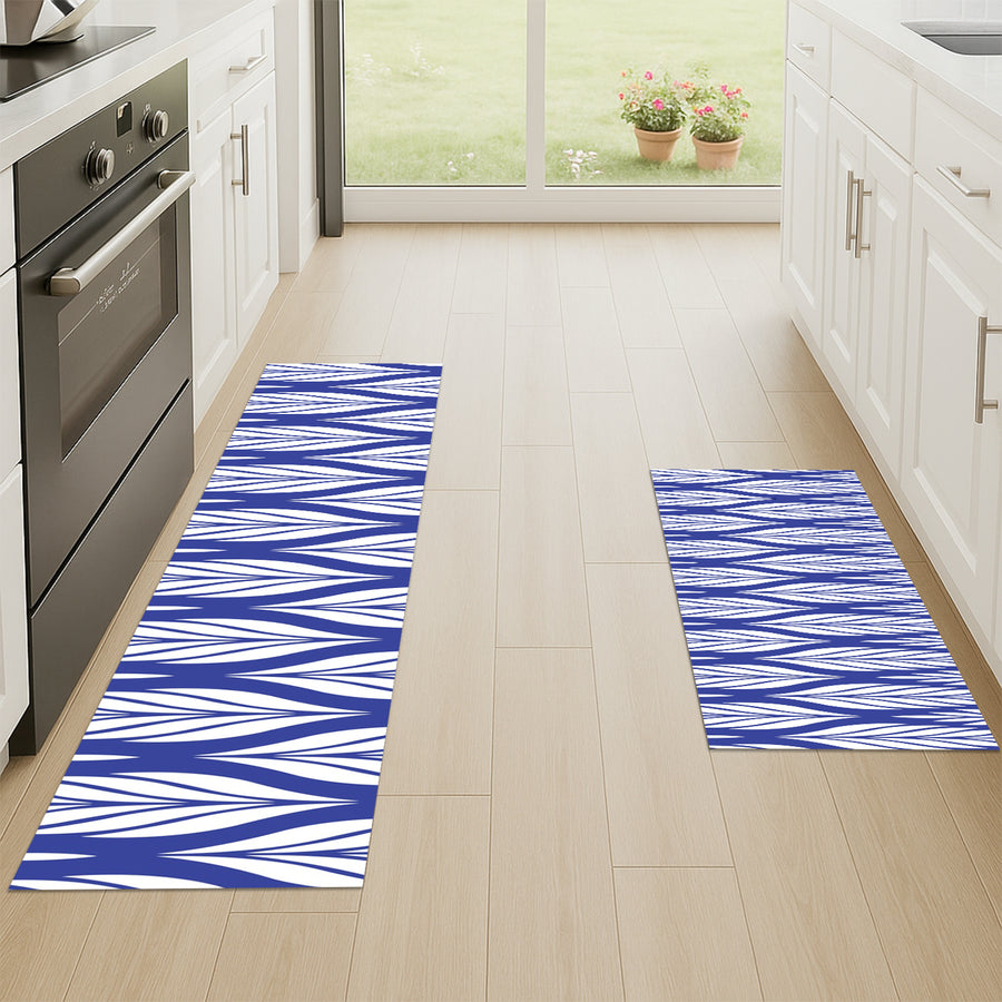 Feblilac White Leaves on Blue kitchen mat in front of a kitchen counter