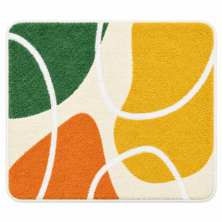 Feblilac Red Yellow Green Abstract Curves tufted bath mat in a bright bathroom beside the bathtub