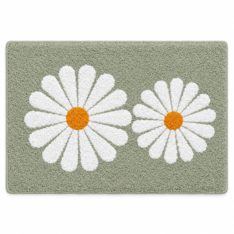 Feblilac Green Daisy Duo tufted bath mat on a tile floor beside the vanity