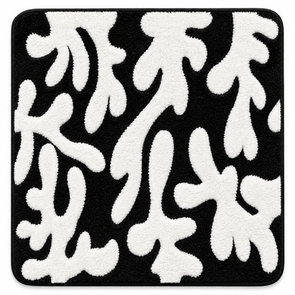 Feblilac Coral tufted bath mat in a bright bathroom beside the bathtub