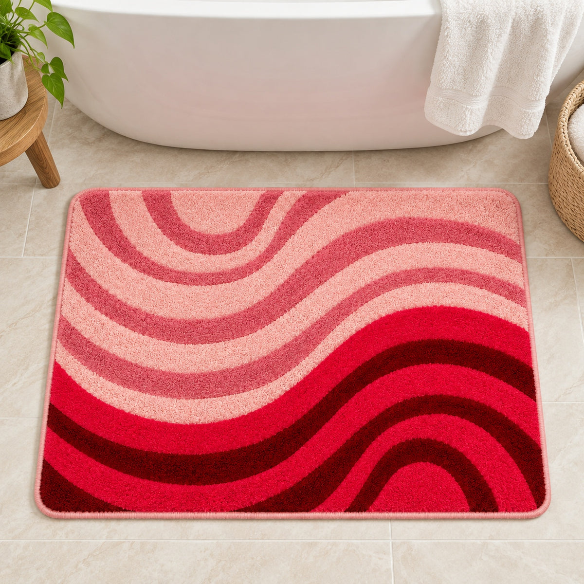Feblilac Minimal Abstract Curves tufted bath mat in front of a bathroom vanity with fresh towels