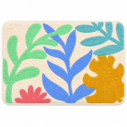Feblilac Colorful Tropical Leaves tufted bath mat in front of a bathroom vanity with fresh towels