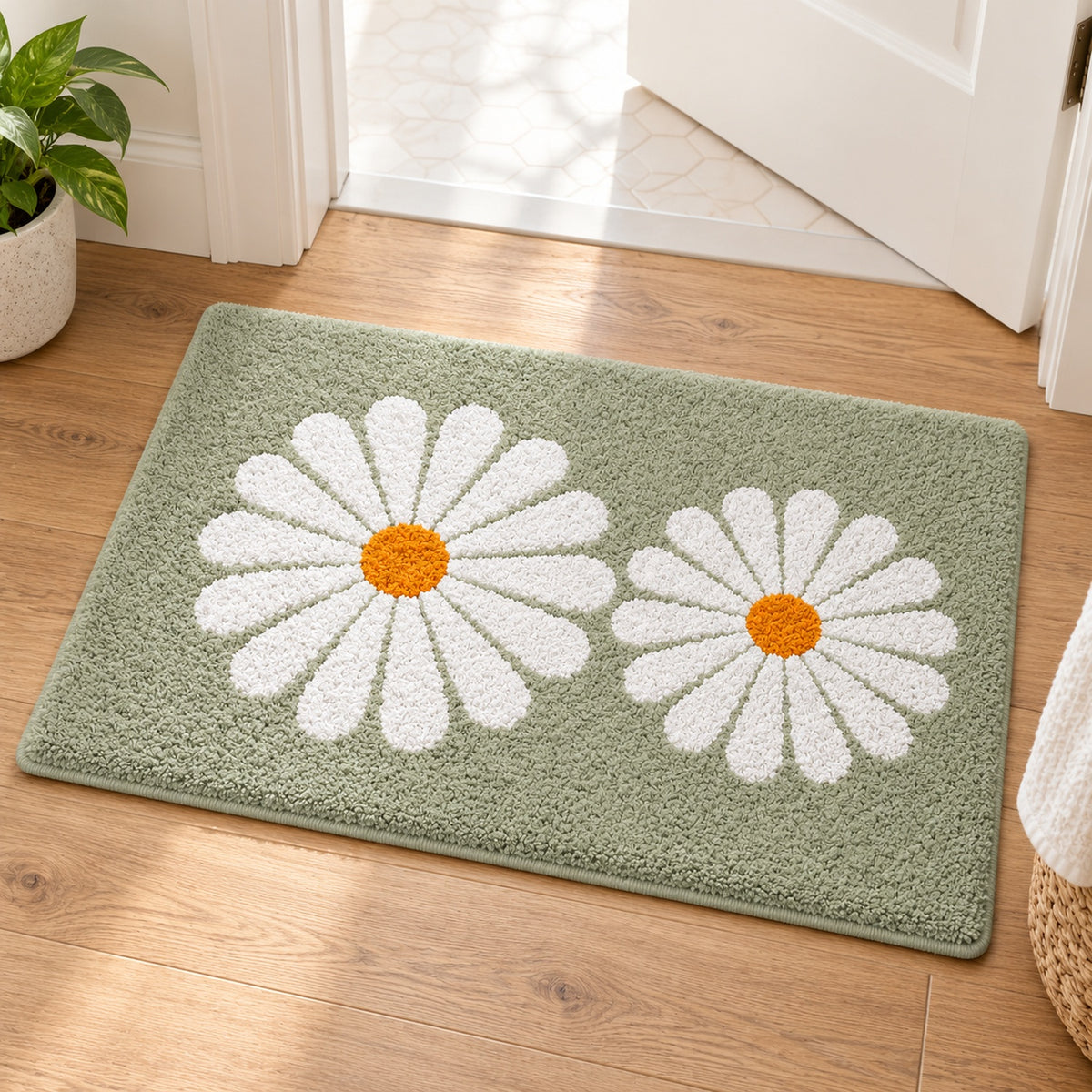 Feblilac Green Daisy Duo tufted bath mat on a light wood floor at the doorway