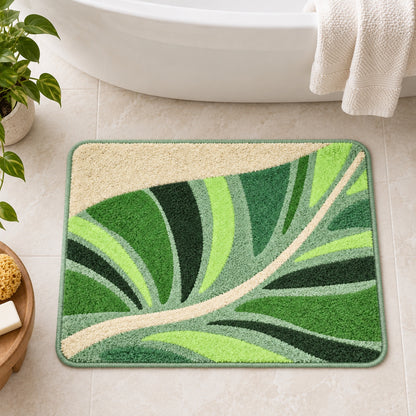 Feblilac Flowing Green Leaves tufted bath mat in a sunny bathroom with a potted plant