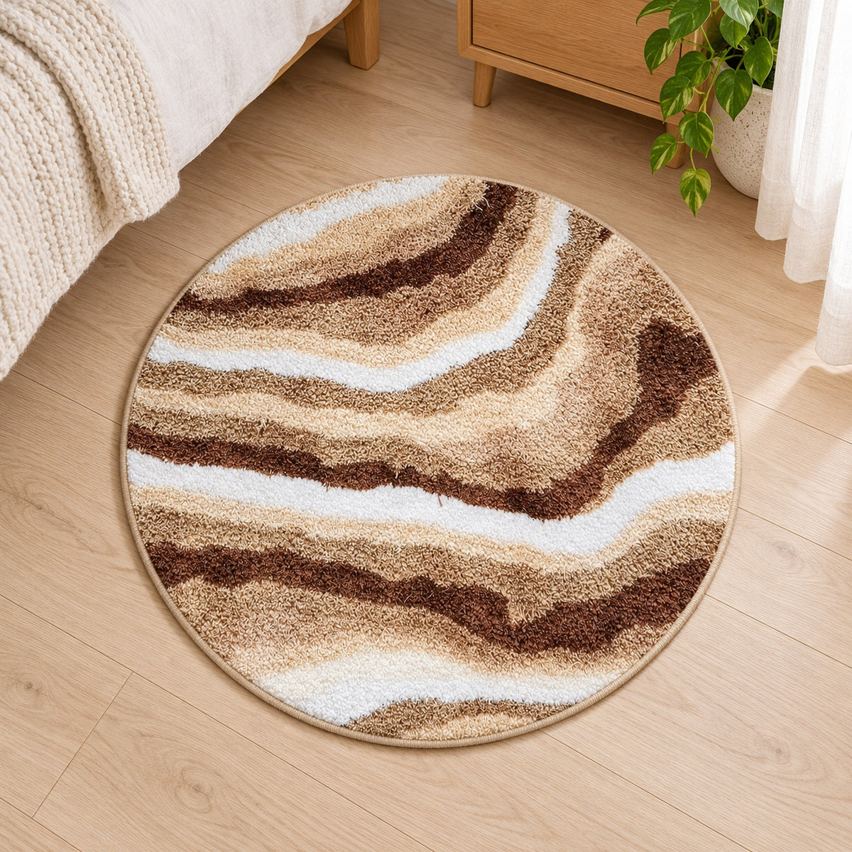 Feblilac Jupiter Marble Round tufted bath mat in a bright bathroom with a potted plant
