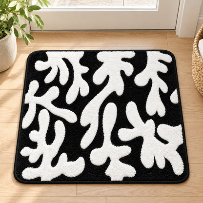 Feblilac Coral tufted bath mat styled in a cosy bathroom corner
