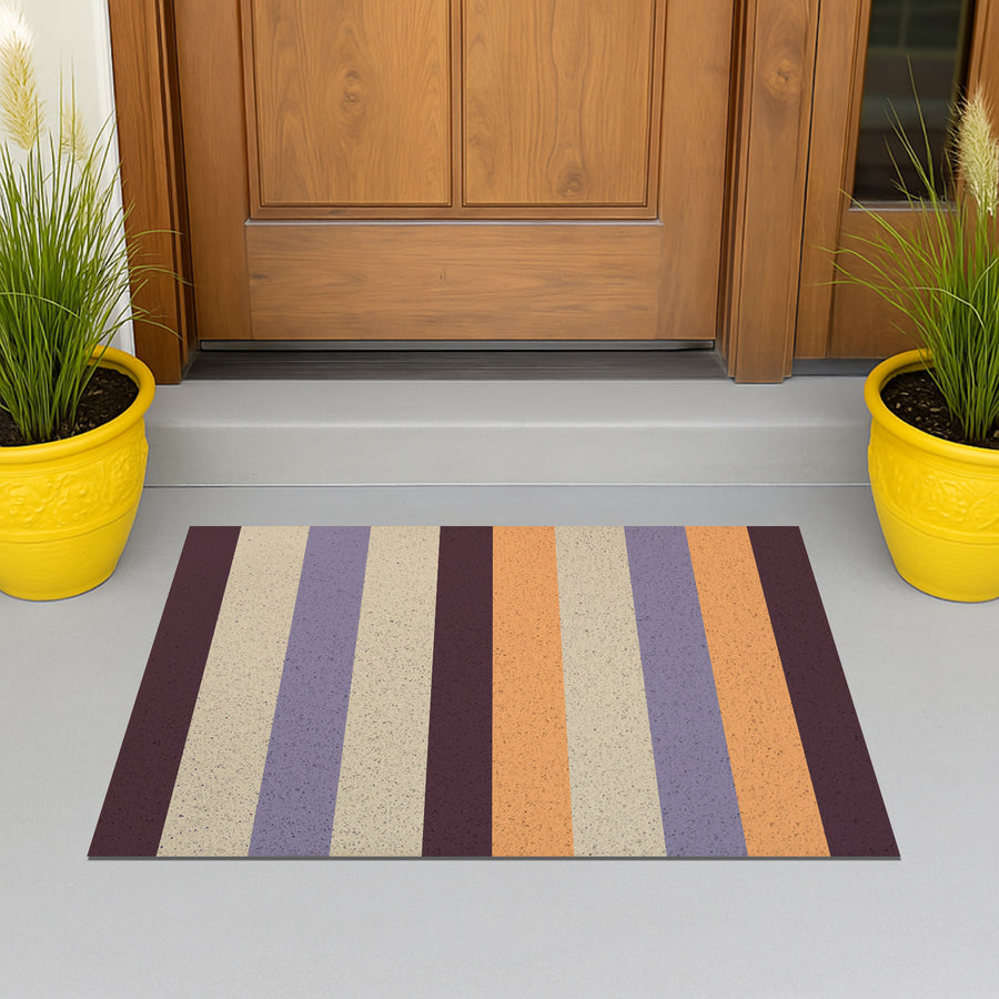 Feblilac Orange and Purple Stripes PVC coil door mat at the front door on a tiled porch