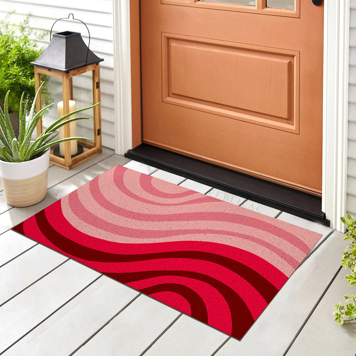 Feblilac Minimal Abstract Curves PVC coil door mat at the front door on a tiled porch
