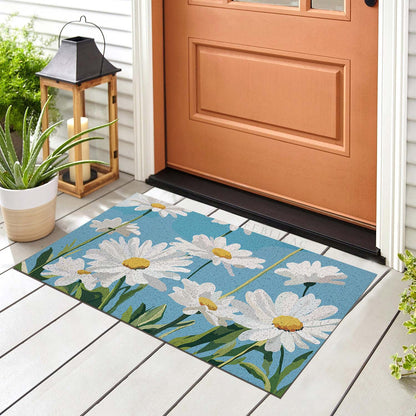 Feblilac Blue Sky Daisies PVC coil door mat at the front door on a tiled porch