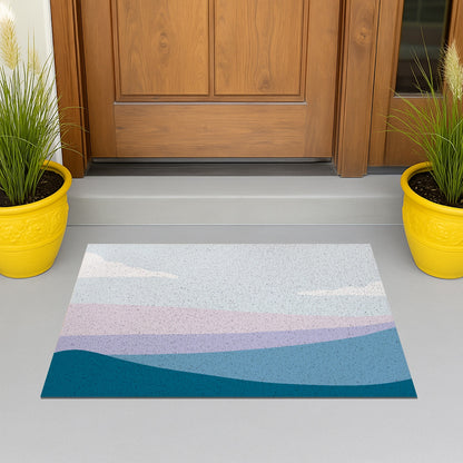 Feblilac Blue and Purple Mountain Mist PVC Coil Door Mat – Abstract Landscape Entrance Mat at a wooden front door with potted plants