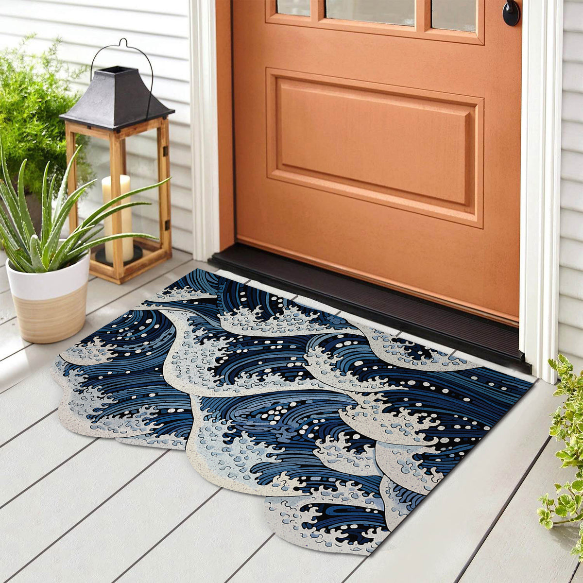 Feblilac Ukiyo-e Wave PVC coil door mat at the front door on a tiled porch