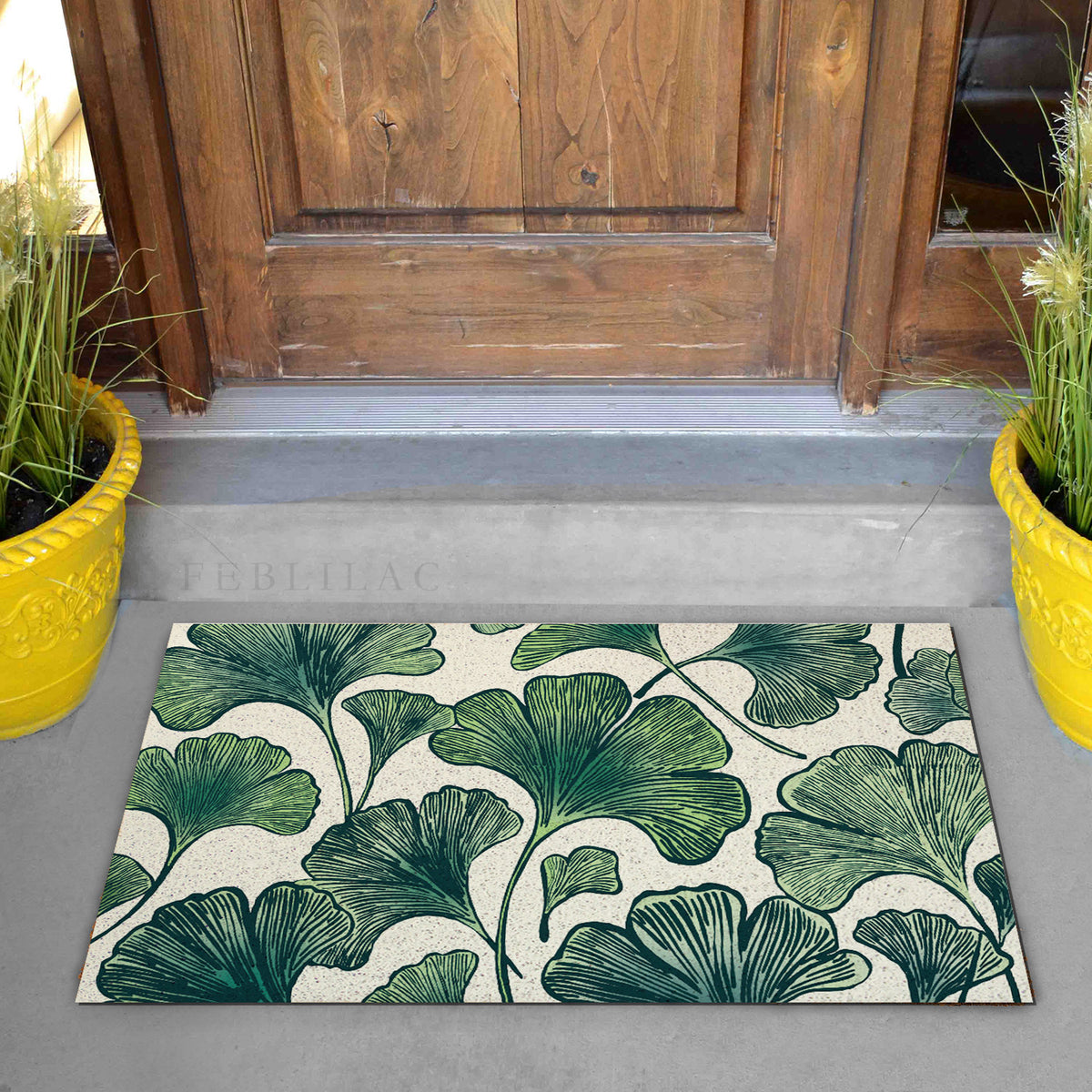 Feblilac Ginkgo Leaf Pattern PVC coil door mat on a doorstep with potted plants