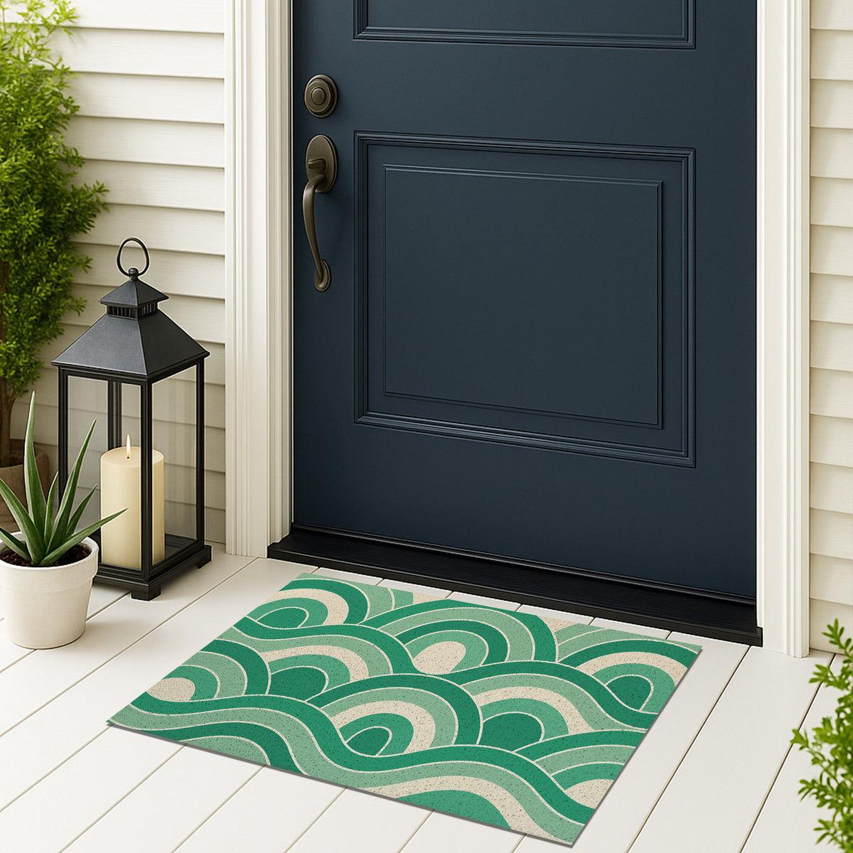 Feblilac Green Wave PVC coil door mat on a doorstep with potted plants