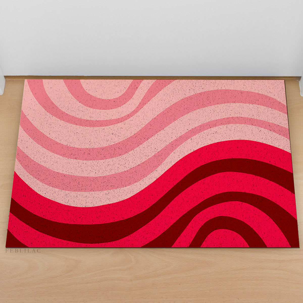 Feblilac Minimal Abstract Curves PVC coil door mat at an entryway with a wooden door
