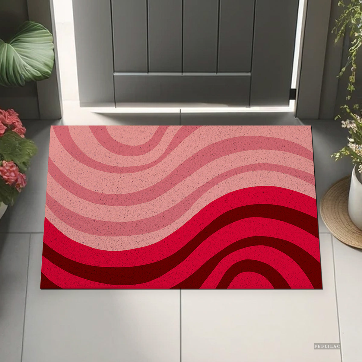 Feblilac Minimal Abstract Curves PVC coil door mat beside a doorway on grey stone