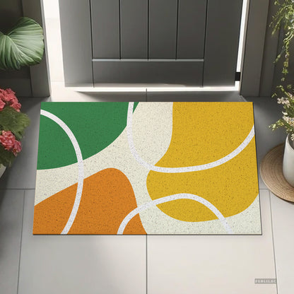 Feblilac Red Yellow Green Abstract Curves PVC coil door mat beside a doorway on grey stone