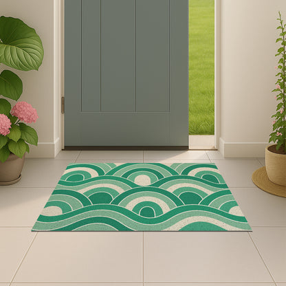Feblilac Green Wave PVC coil door mat beside a doorway on grey stone