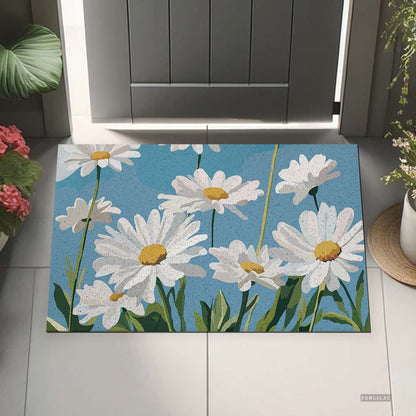 Feblilac Blue Sky Daisies PVC coil door mat beside a doorway on grey stone